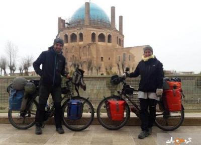 عکس، زن و شوهر ایتالیایی با دوچرخه به گنبد سلطانیه رسیدند
